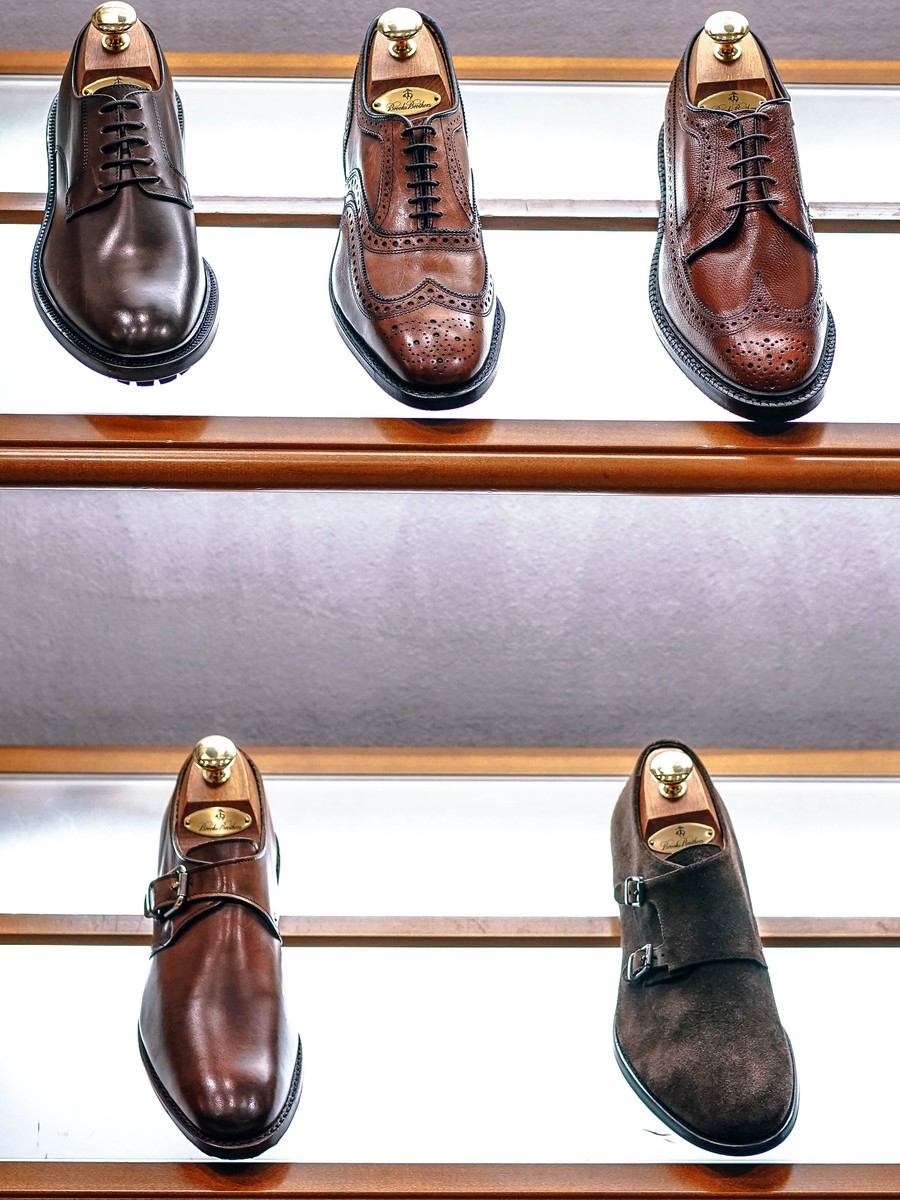 Rows of shiny new men's shoes